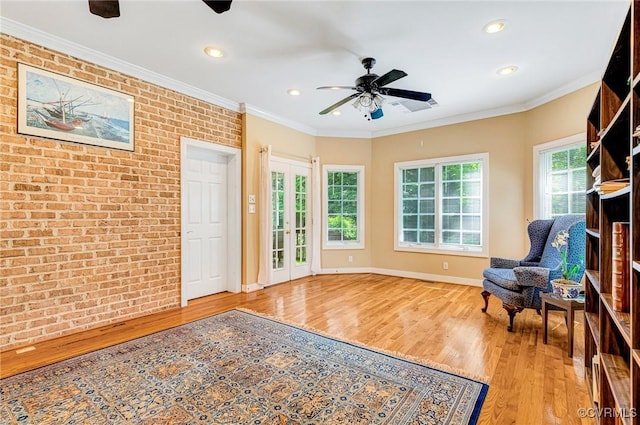 5605 Hunters Glen Dr, Glen Allen, VA 23059 - living area featuring wood finished floors, a ceiling fan, brick wall, baseboards, and recessed lighting