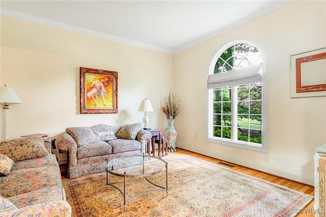 5605 Hunters Glen Dr, Glen Allen, VA 23059 - living room with ornamental molding, wood finished floors, and baseboards