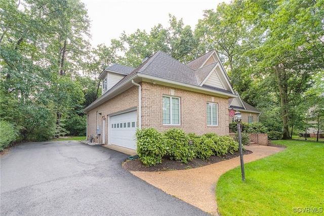 5605 Hunters Glen Dr, Glen Allen, VA 23059 - view of side of property featuring driveway, a garage, brick siding, a yard, and roof with shingles