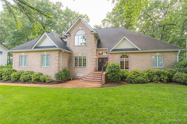 5605 Hunters Glen Dr, Glen Allen, VA 23059 - traditional home featuring a front lawn, brick siding, and roof with shingles
