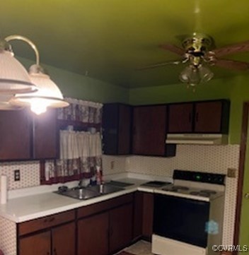 2812 Old Nottoway Rd, Crewe, VA 23930 - kitchen featuring electric stove, under cabinet range hood, backsplash, light countertops, and ceiling fan