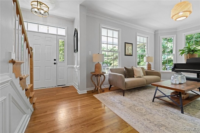 11137 Sterling Cove Dr, Chesterfield, VA 23838 - foyer entrance with light wood-style floors, crown molding, baseboards, and a chandelier
