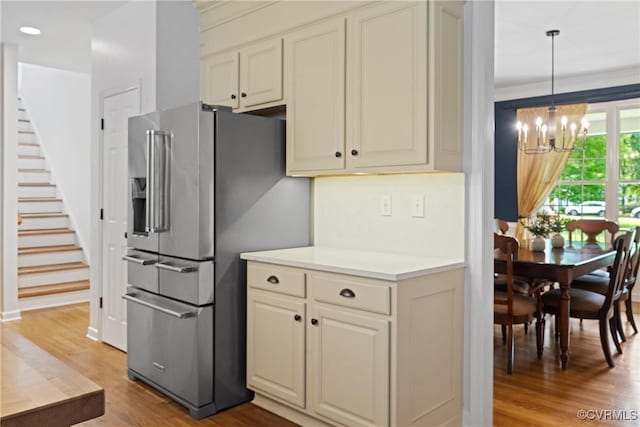 11137 Sterling Cove Dr, Chesterfield, VA 23838 - kitchen featuring high quality fridge, a chandelier, light wood-style flooring, light countertops, and decorative light fixtures