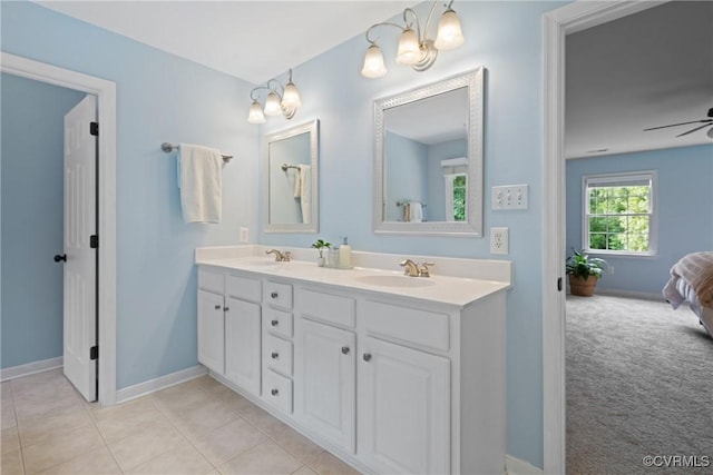 11137 Sterling Cove Dr, Chesterfield, VA 23838 - full bathroom with double vanity, baseboards, connected bathroom, and a ceiling fan
