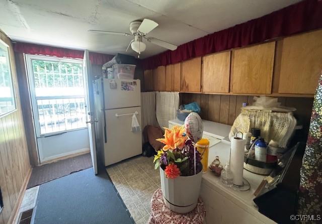 2095 Beef Rd, Greenville, VA 23847 - kitchen with freestanding refrigerator, a ceiling fan, and light flooring