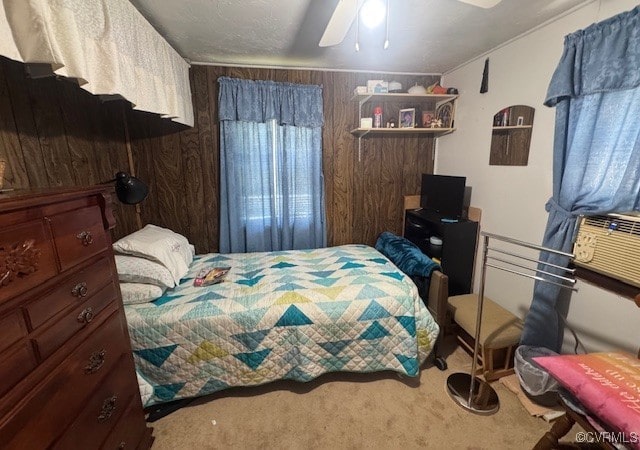 2095 Beef Rd, Greenville, VA 23847 - carpeted bedroom with ceiling fan and wooden walls