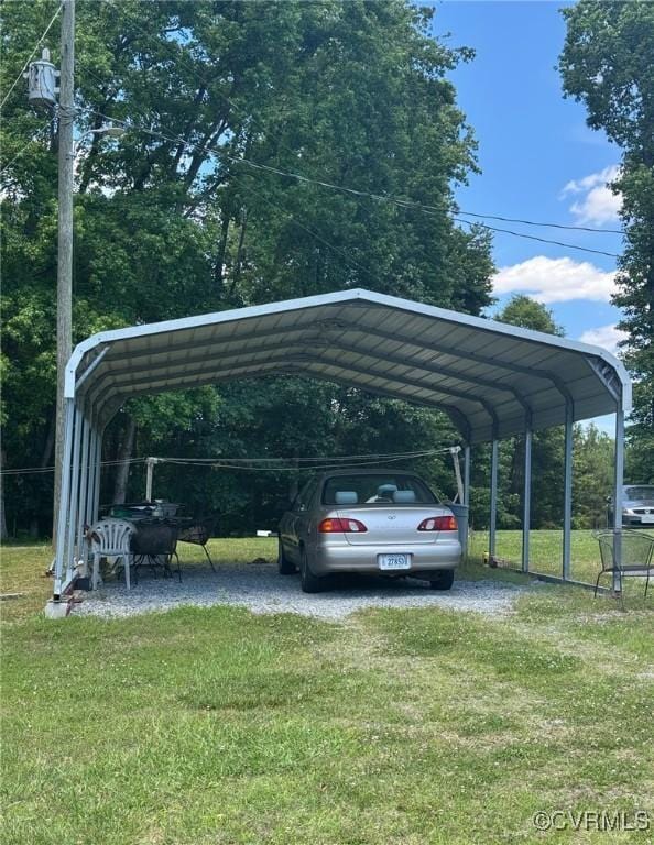 2095 Beef Rd, Greenville, VA 23847 - view of parking / parking lot featuring a detached carport and driveway