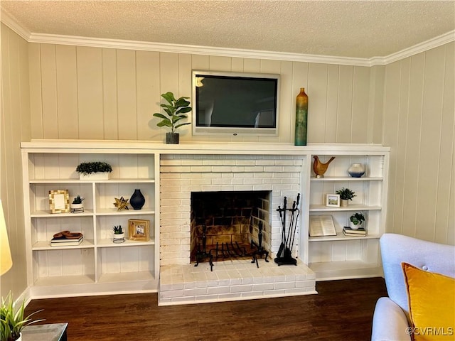 8409 Zell Ln, Henrico, VA 23229 - living room with wood finished floors, ornamental molding, a textured ceiling, and a fireplace