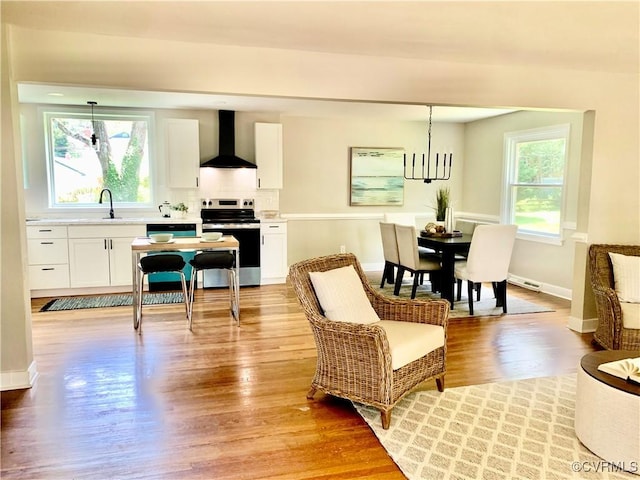 8409 Zell Ln, Henrico, VA 23229 - living room with light wood finished floors and baseboards