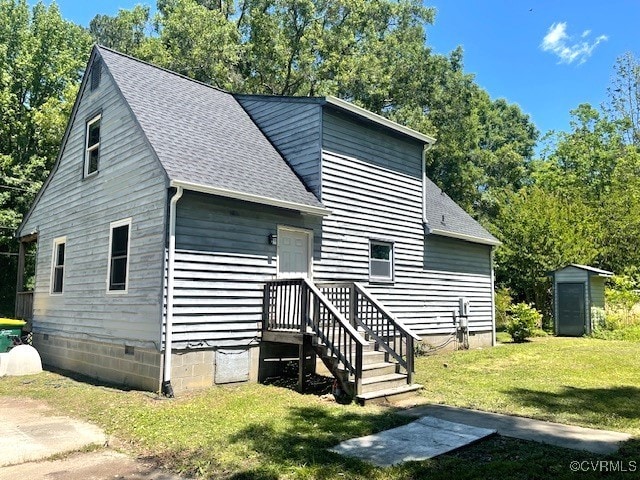 3706 Burnham Dr, Hopewell, VA 23860 - back of property with crawl space, roof with shingles, and a lawn