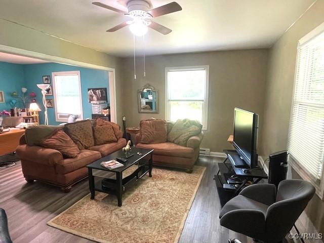 3706 Burnham Dr, Hopewell, VA 23860 - living room with plenty of natural light, wood finished floors, and a ceiling fan