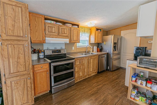 19083 Country Rd, Beaverdam, VA 23015 - kitchen featuring stainless steel appliances, a sink, ventilation hood, a textured ceiling, and dark wood-style flooring