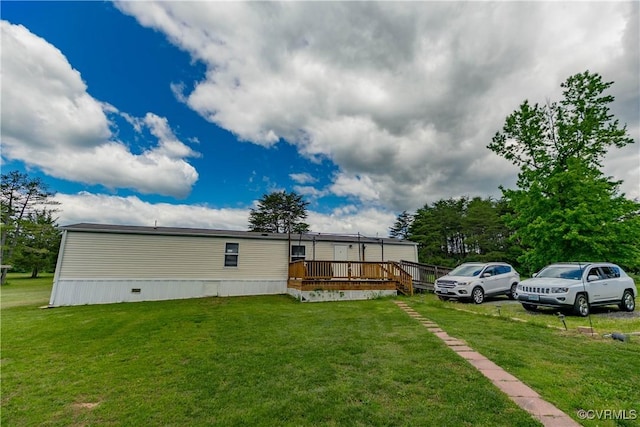 19083 Country Rd, Beaverdam, VA 23015 - view of front of house featuring a wooden deck and a front lawn