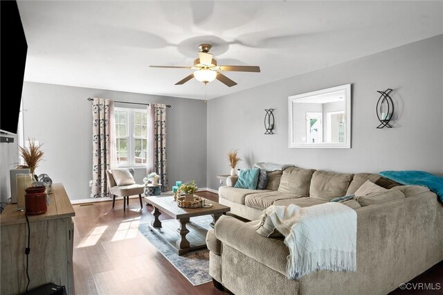 7012 Autumn Point Dr, North Chesterfield, VA 23234 - living area with ceiling fan, wood finished floors, and baseboards
