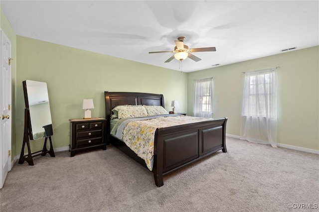 7012 Autumn Point Dr, North Chesterfield, VA 23234 - bedroom with light carpet, baseboards, and a ceiling fan