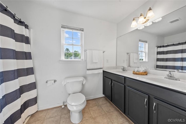 7012 Autumn Point Dr, North Chesterfield, VA 23234 - full bath with double vanity, toilet, baseboards, and curtained shower
