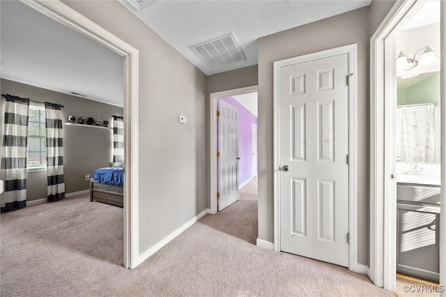 7012 Autumn Point Dr, North Chesterfield, VA 23234 - corridor featuring carpet and baseboards