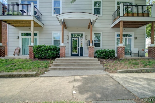 1020 Porter St Unit 103, Richmond, VA 23224 - view of exterior entry featuring a balcony