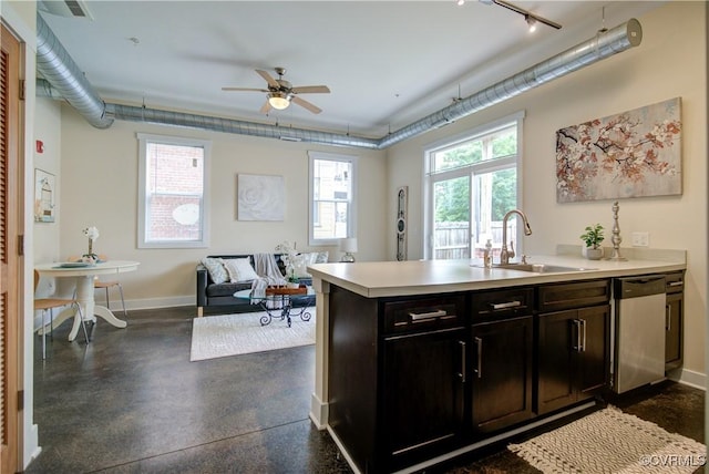 1020 Porter St Unit 103, Richmond, VA 23224 - kitchen featuring dishwasher, a sink, light countertops, a ceiling fan, and baseboards