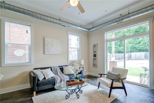 1020 Porter St Unit 103, Richmond, VA 23224 - living area featuring baseboards and a ceiling fan