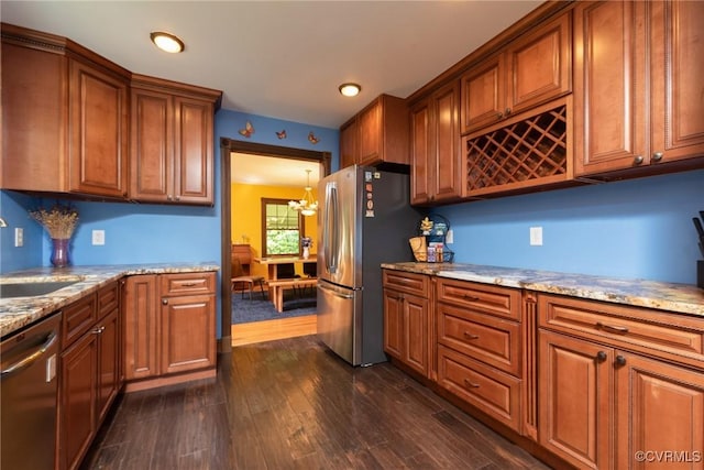 14421 Clazemont Rd, Montpelier, VA 23192 - kitchen with stainless steel appliances, brown cabinets, and recessed lighting