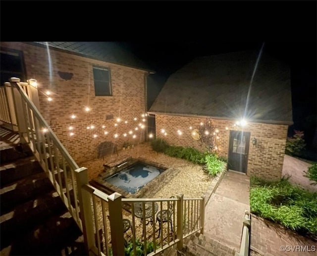 14421 Clazemont Rd, Montpelier, VA 23192 - patio at twilight featuring an outdoor hot tub