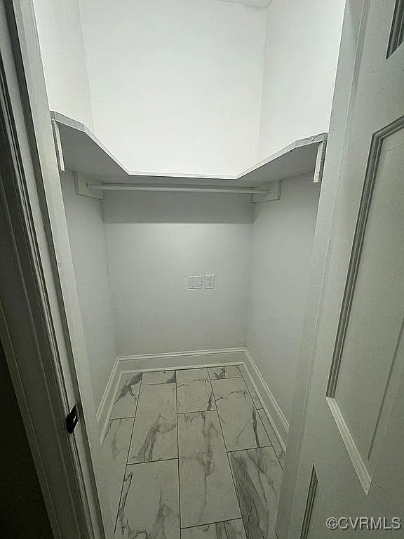 226 Purdy Rd, Emporia, VA 23847 - spacious closet featuring marble look tile flooring