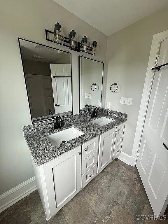 226 Purdy Rd, Emporia, VA 23847 - full bath with baseboards and double vanity