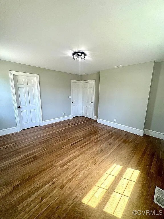 226 Purdy Rd, Emporia, VA 23847 - unfurnished room with baseboards and wood finished floors