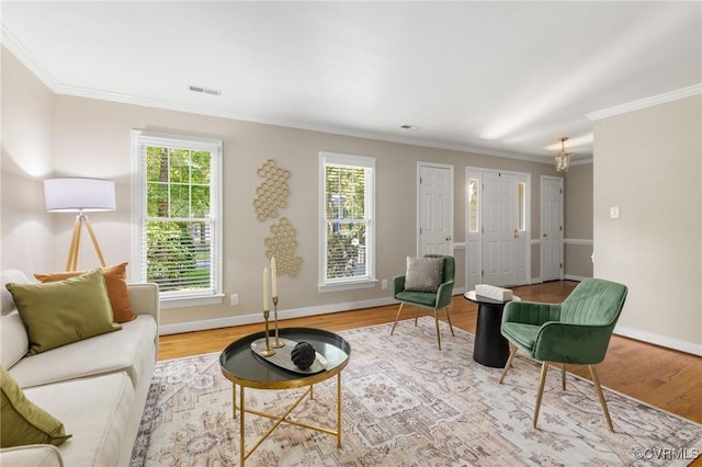 15210 Powell Grove Rd, Midlothian, VA 23112 - living area with plenty of natural light, ornamental molding, and wood finished floors