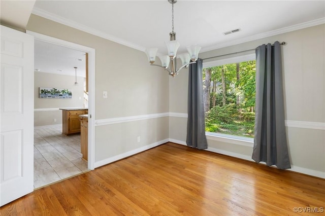 15210 Powell Grove Rd, Midlothian, VA 23112 - spare room with a chandelier, light wood-style floors, and ornamental molding