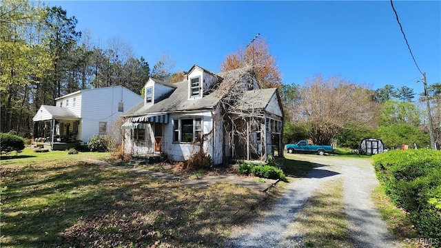 1989 Cox Rd, Nottoway, VA 23824 - view of home's exterior with dirt driveway and a yard