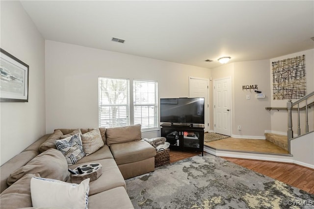 2906 Mary Beth Ln, Henrico, VA 23060 - living area with wood finished floors, stairs, and baseboards