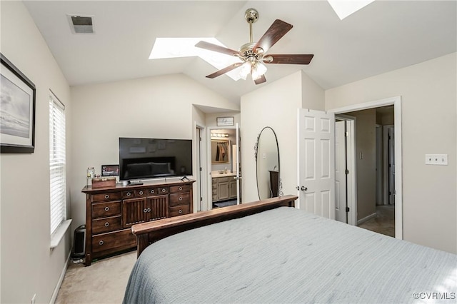 2906 Mary Beth Ln, Henrico, VA 23060 - bedroom with a skylight, light carpet, vaulted ceiling, baseboards, and ensuite bathroom