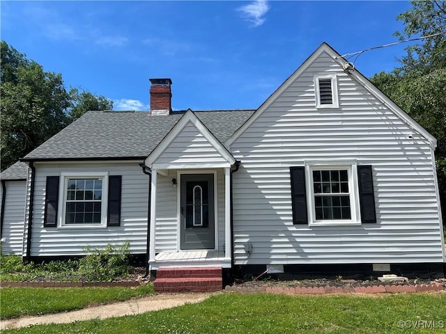 1799 N Washington St, Henrico, VA 23075 - view of front of home featuring a chimney and roof with shingles