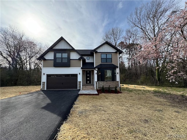 120 Drybridge Ct, Henrico, VA 23150 - view of front of property featuring an attached garage, driveway, stone siding, and a front yard