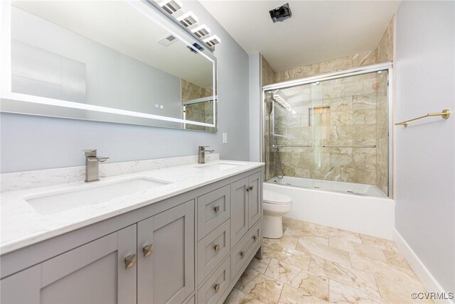 120 Drybridge Ct, Henrico, VA 23150 - full bath featuring toilet, double vanity, shower / bath combination with glass door, and baseboards