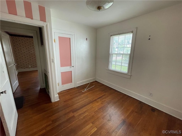 737 Jefferson Pl, Petersburg, VA 23803 - spare room featuring wood finished floors and baseboards