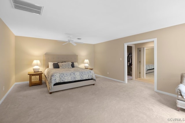 532 Fords Rd, Manakin Sabot, VA 23103 - bedroom with light carpet, baseboards, and a spacious closet