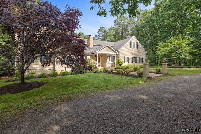 532 Fords Rd, Manakin Sabot, VA 23103 - view of front of house featuring a chimney, a front yard, a porch, and dirt driveway