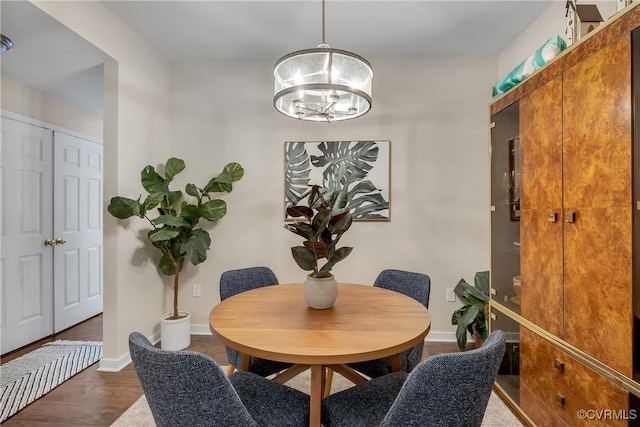 4613 Milfax Rd, Chesterfield, VA 23224 - dining area featuring a chandelier and wood finished floors