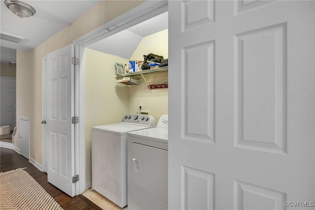 4613 Milfax Rd, Chesterfield, VA 23224 - washroom with washing machine and dryer and wood finished floors