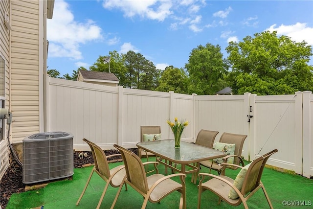 4613 Milfax Rd, Chesterfield, VA 23224 - fenced backyard featuring outdoor dining space and a gate
