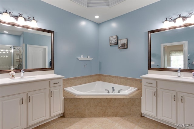 11715 Triple Notch Ter, Henrico, VA 23233 - full bathroom with two vanities, a bath, a shower stall, and tile patterned flooring