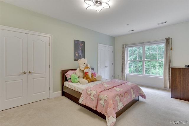 11715 Triple Notch Ter, Henrico, VA 23233 - carpeted bedroom with two closets and baseboards