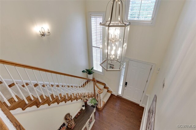 11715 Triple Notch Ter, Henrico, VA 23233 - foyer entrance featuring a chandelier, stairs, healthy amount of natural light, and wood finished floors