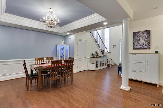 11715 Triple Notch Ter, Henrico, VA 23233 - dining room with stairway, crown molding, wood finished floors, a chandelier, and decorative columns