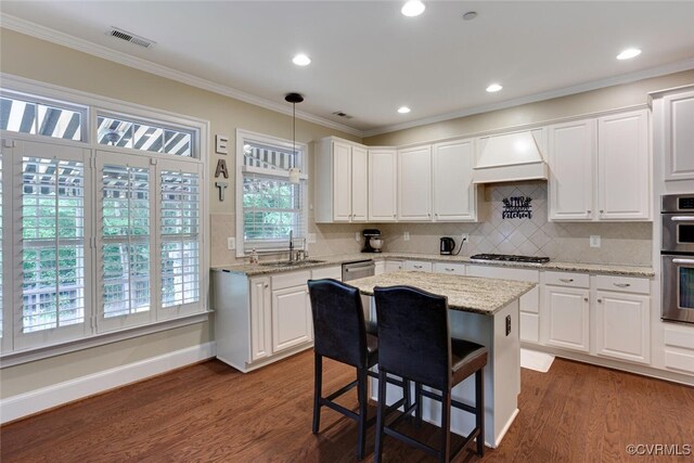 11715 Triple Notch Ter, Henrico, VA 23233 - kitchen featuring a sink, dark wood finished floors, white cabinets, ornamental molding, and recessed lighting