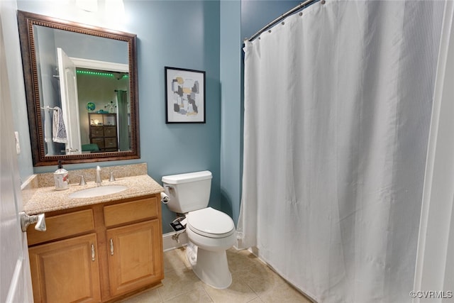 11715 Triple Notch Ter, Henrico, VA 23233 - full bath featuring toilet, tile patterned flooring, vanity, a shower with shower curtain, and baseboards