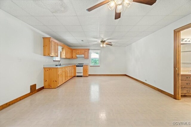 3786 Donavon Mill Ct, Powhatan, VA 23139 - kitchen featuring white stove, a ceiling fan, light countertops, a paneled ceiling, and baseboards